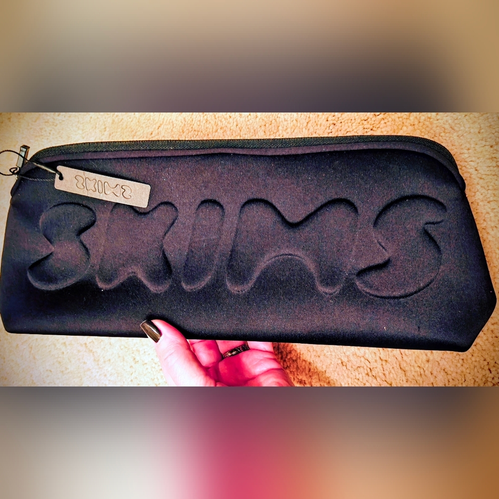 NWT SKIMS Neoprene Black Soot Travel Pouch.